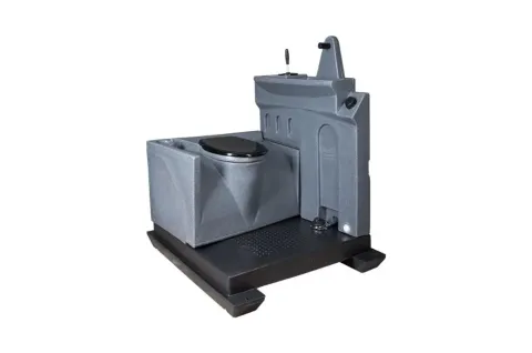 Toilettank Fresh Flush, grijze unit met een zwart deksel op een donker platform